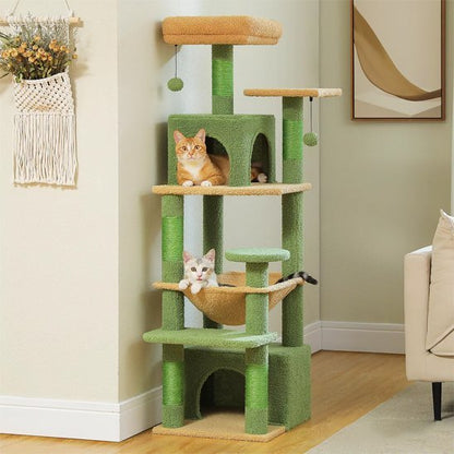 Arbre à chat vert et beige multi niveaux avec niches, hamac et plateformes dans un salon
