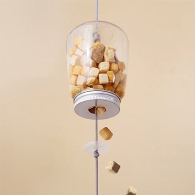 détail du distributeur de friandises du jouet interactif pour chat