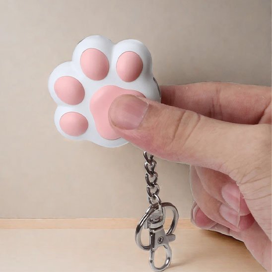 Laser pour chat en forme de patte rose avec mousqueton